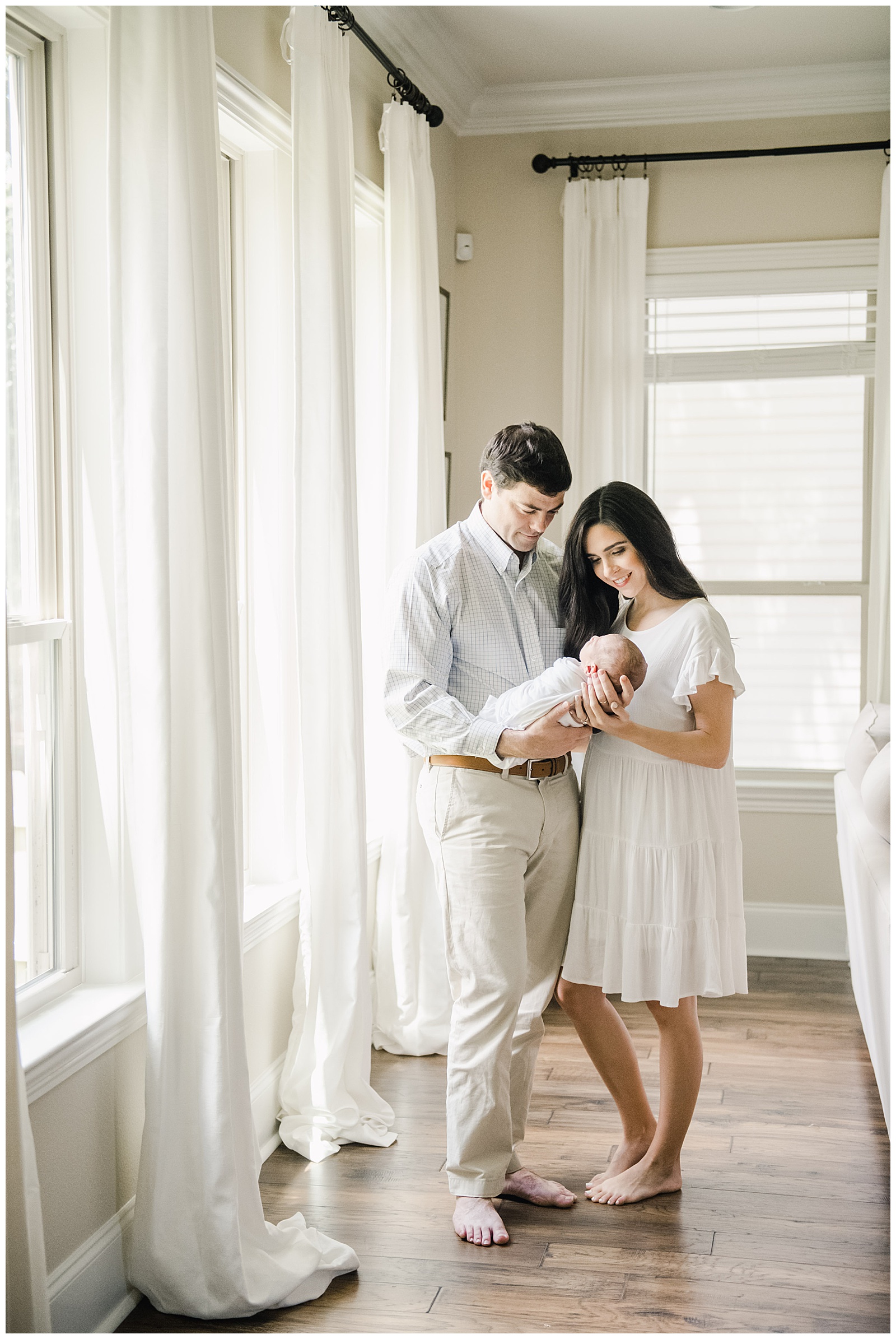 New Orleans Baby Photographer Chelsea Rousey Photography mom and dad holding baby