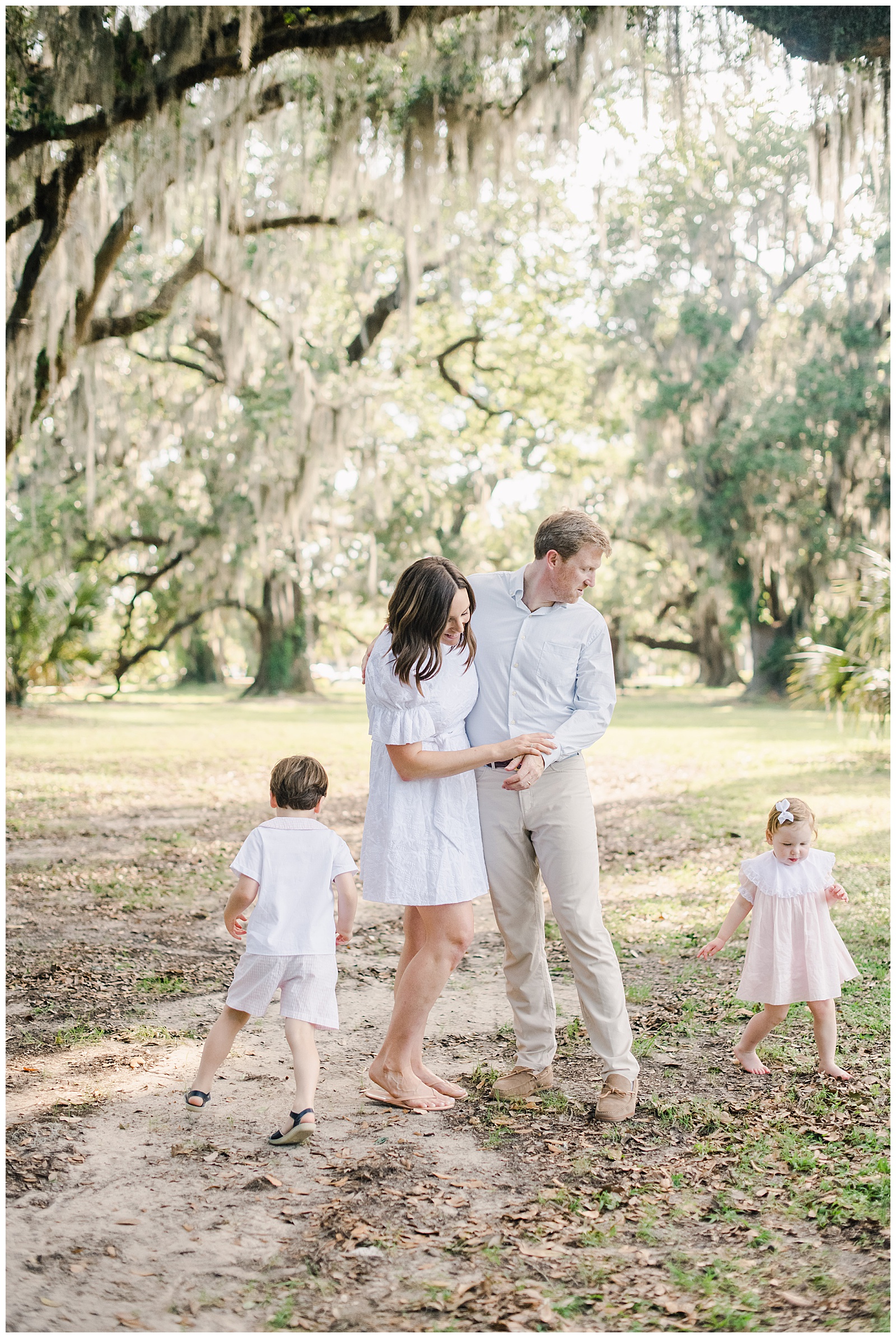 New Orleans Family Photographer Chelsea Rousey Photography kids play ring around the rosie while mom and dad watch