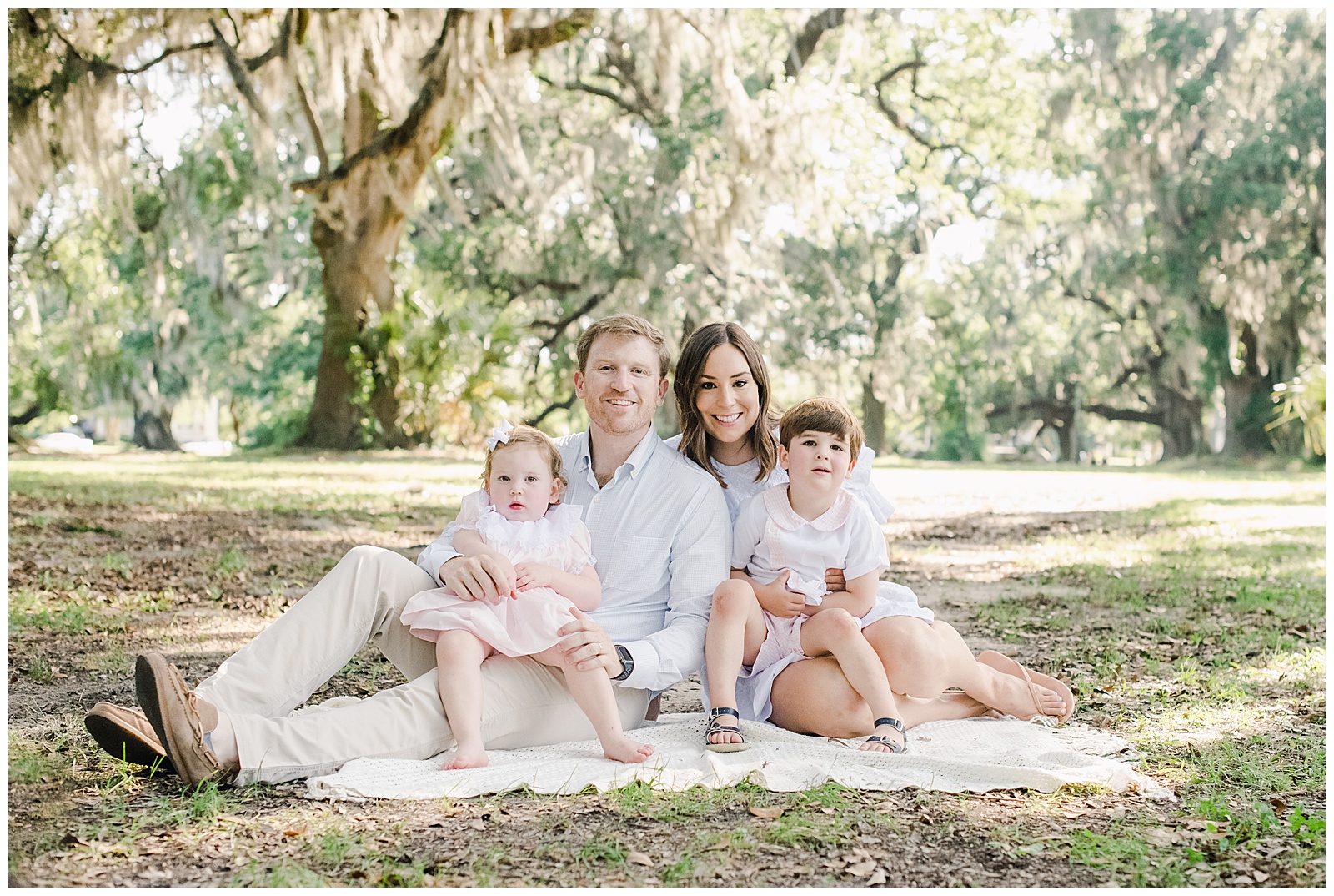 New Orleans Family Photographer Chelsea Rousey Photography family photo in live oak trees